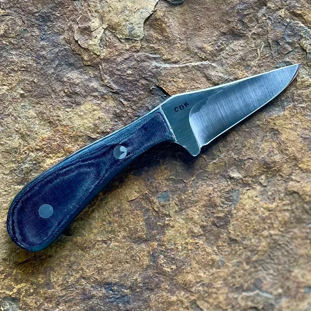 Small EDC in 1095 w/ Black Linen Micarta